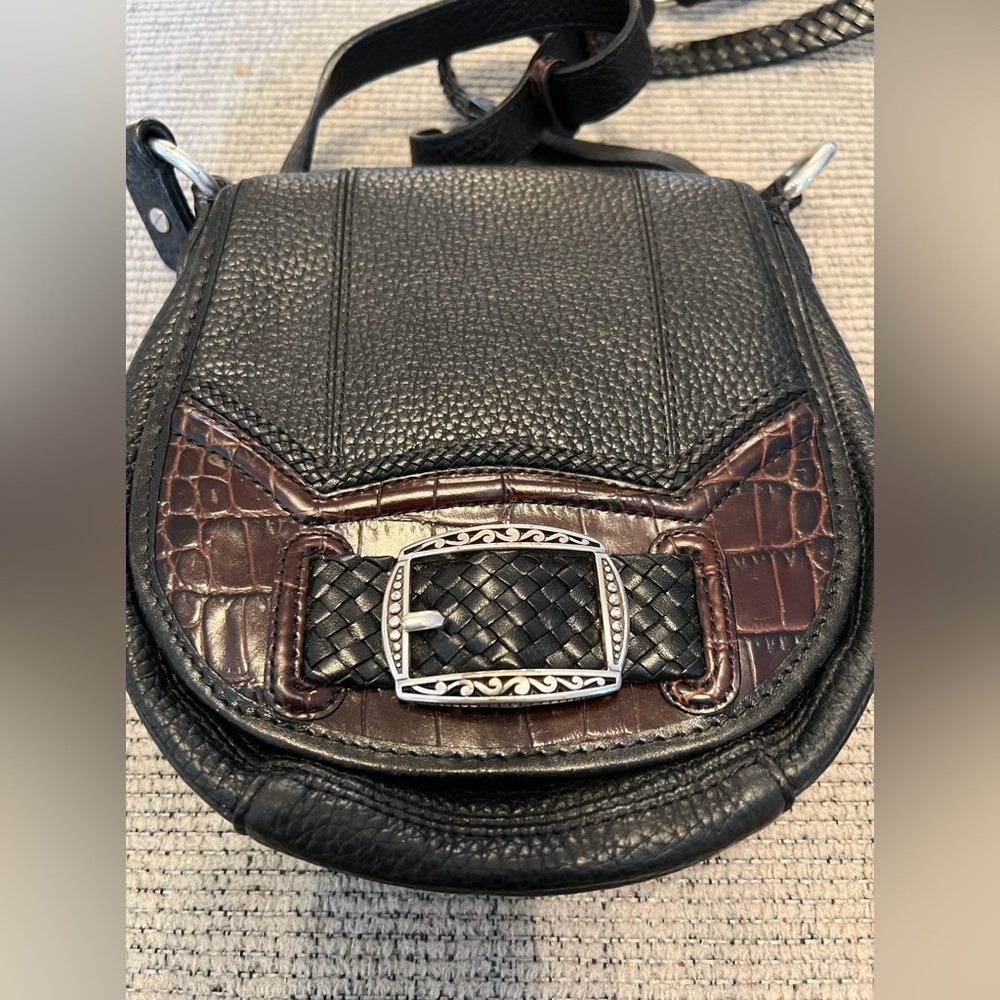 7 1/2 in depth/ 7 1/2 in width. Crossbody Brighton leather purse.